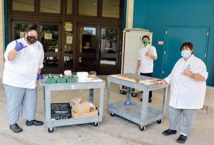 Culinary students prepare lunches for fellow students and volunteers